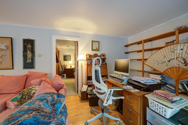 office area with light hardwood / wood-style flooring