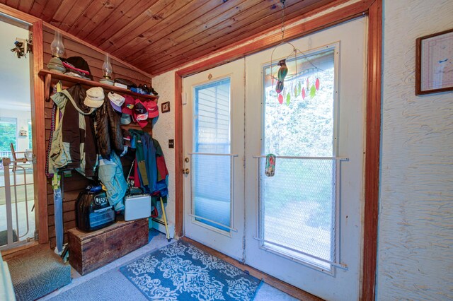 doorway with wood ceiling, lofted ceiling, and french doors