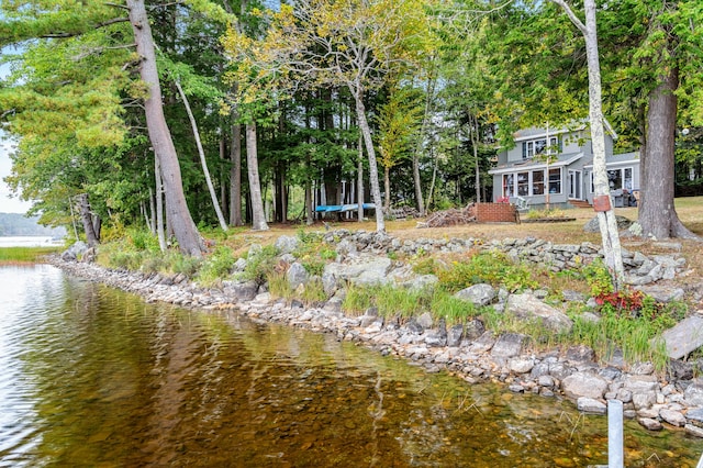 exterior space with a water view