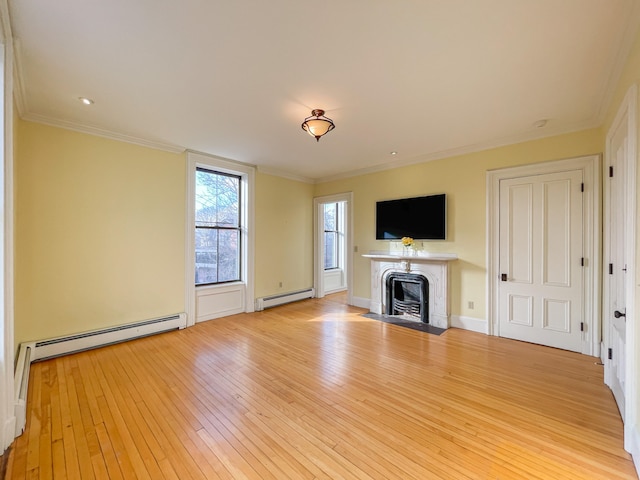 unfurnished living room featuring ornamental molding, a baseboard radiator, and light hardwood / wood-style floors