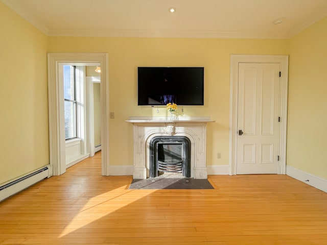 unfurnished living room featuring ornamental molding, a baseboard radiator, and light hardwood / wood-style floors