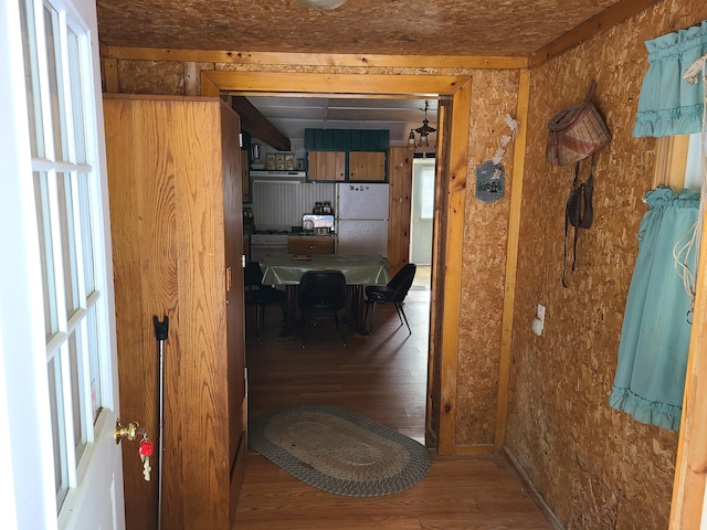 corridor featuring hardwood / wood-style floors