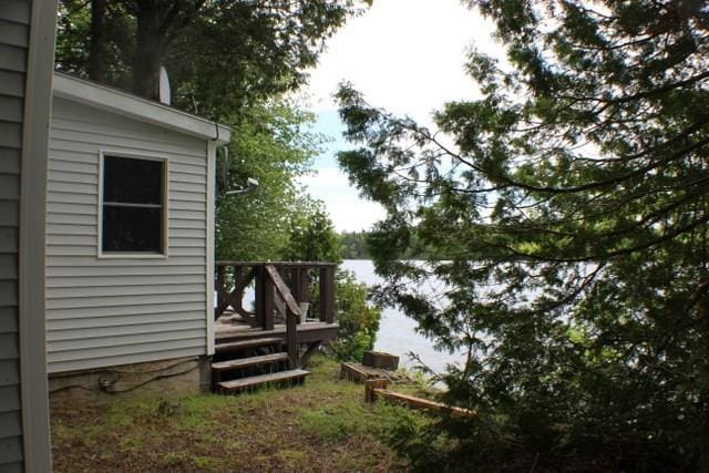 view of yard featuring a wooden deck