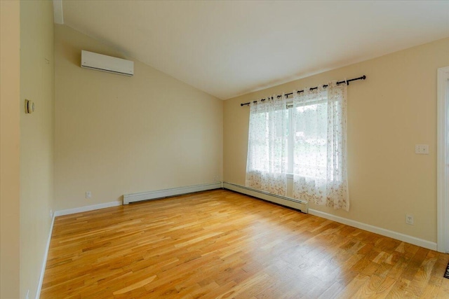 spare room featuring a wall mounted air conditioner, a baseboard radiator, lofted ceiling, and hardwood / wood-style floors