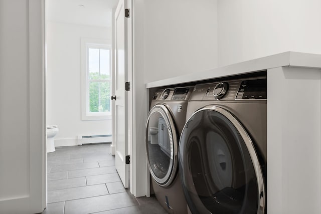 761 Fort Hill Rd, Gorham, ME 04038 - laundry room featuring tile patterned flooring, baseboard heating, laundry area, and separate washer and dryer