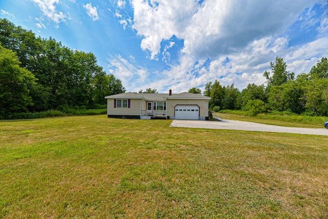 view of front facade with a garage and a front lawn