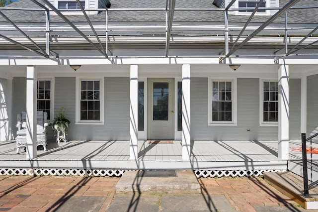 doorway to property featuring a porch