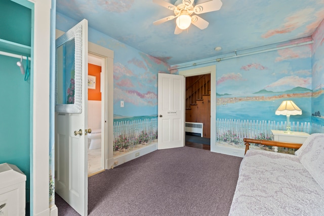 bedroom with radiator, dark colored carpet, and ceiling fan