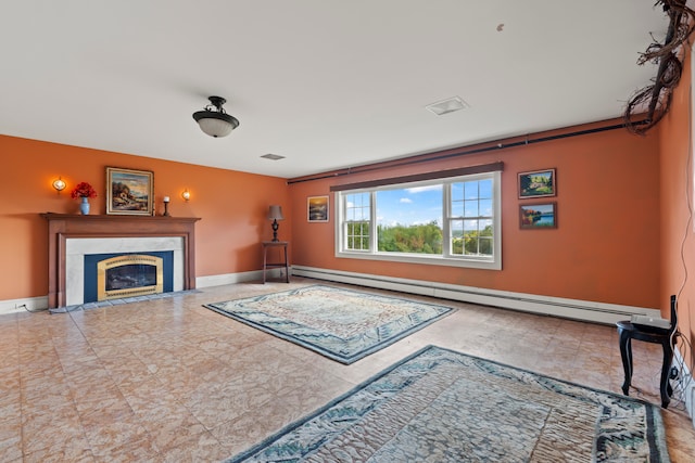 living room with a high end fireplace and baseboard heating