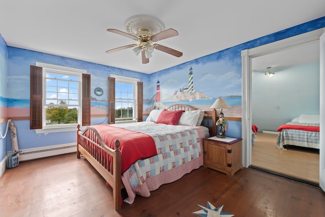 bedroom with ceiling fan, hardwood / wood-style flooring, and a baseboard radiator