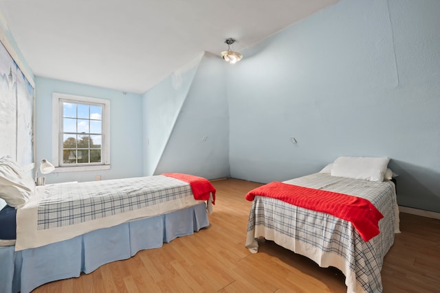 bedroom featuring wood-type flooring