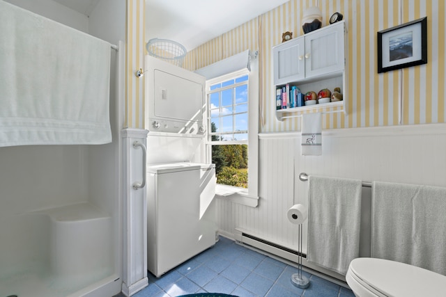 bathroom with toilet and tile patterned floors