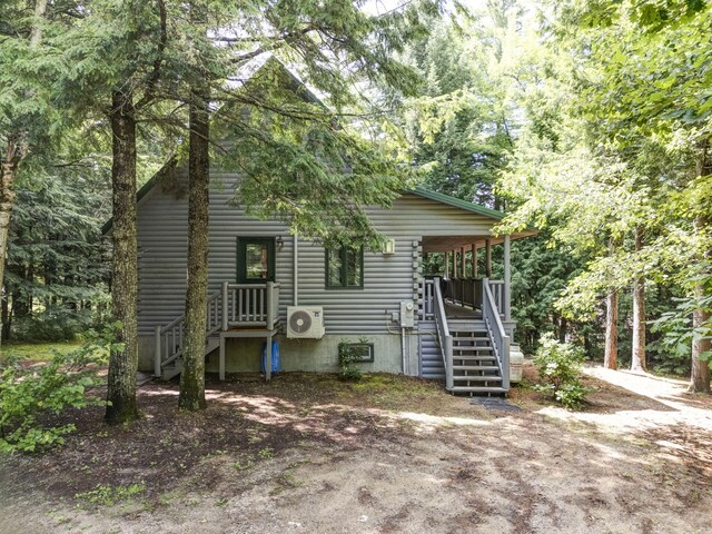 view of front of house featuring ac unit