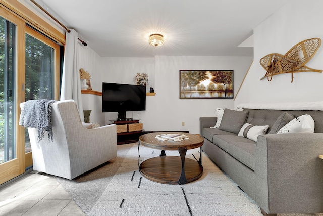 living room with light tile patterned floors