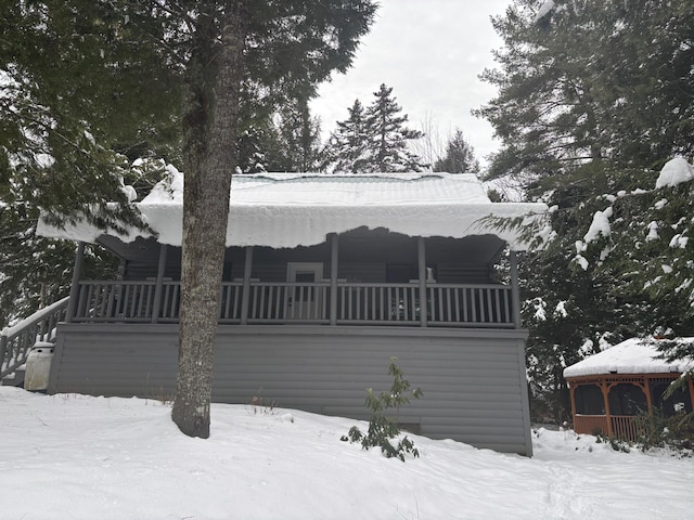 view of snow covered property