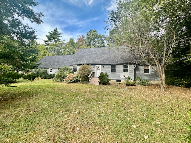 ranch-style home with a front yard