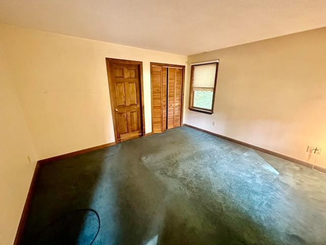 unfurnished bedroom featuring carpet