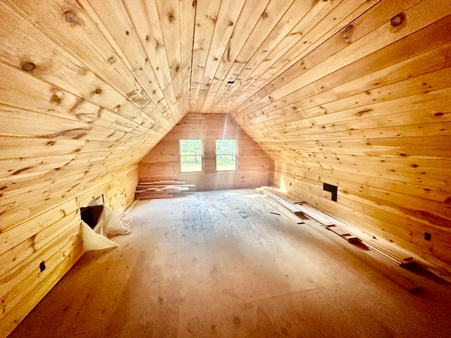 bonus room with vaulted ceiling, wood walls, and wooden ceiling