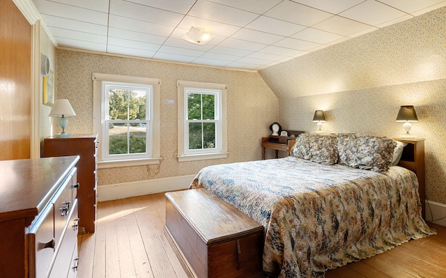 1276 State Route 32, Bristol, ME 04564 - bedroom featuring hardwood / wood-style floors, baseboards, wallpapered walls, and ornamental molding