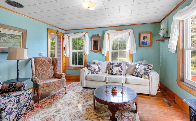 1276 State Route 32, Bristol, ME 04564 - living room with a wealth of natural light, crown molding, wood finished floors, and visible vents