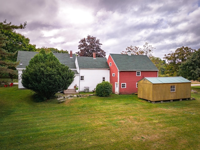 1276 State Route 32, Bristol, ME 04564 - rear view of house with an outbuilding and a lawn