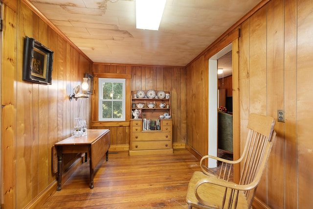 1276 State Route 32, Bristol, ME 04564 - sitting room with wooden walls, baseboards, and hardwood / wood-style flooring