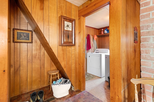 1276 State Route 32, Bristol, ME 04564 - laundry room with laundry area, wood walls, brick floor, and washer and clothes dryer