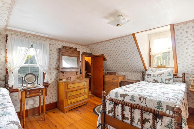 1276 State Route 32, Bristol, ME 04564 - bedroom with crown molding, light wood-style flooring, and wallpapered walls