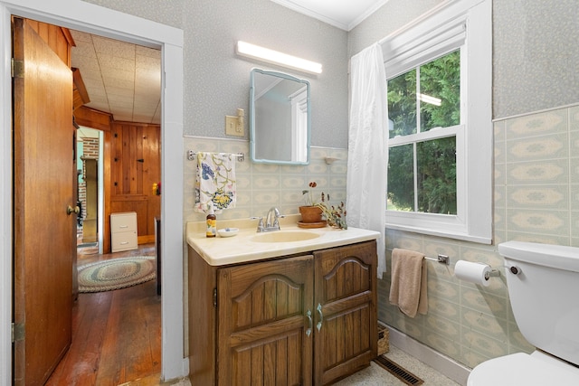 1276 State Route 32, Bristol, ME 04564 - bathroom with vanity, tile walls, toilet, and wainscoting