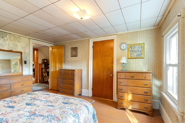 1276 State Route 32, Bristol, ME 04564 - bedroom with ornamental molding, light wood-style flooring, multiple windows, and wallpapered walls
