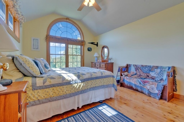 bedroom featuring vaulted ceiling, ceiling fan, and hardwood / wood-style floors