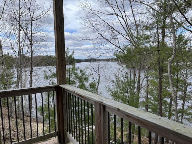 wooden terrace with a water view