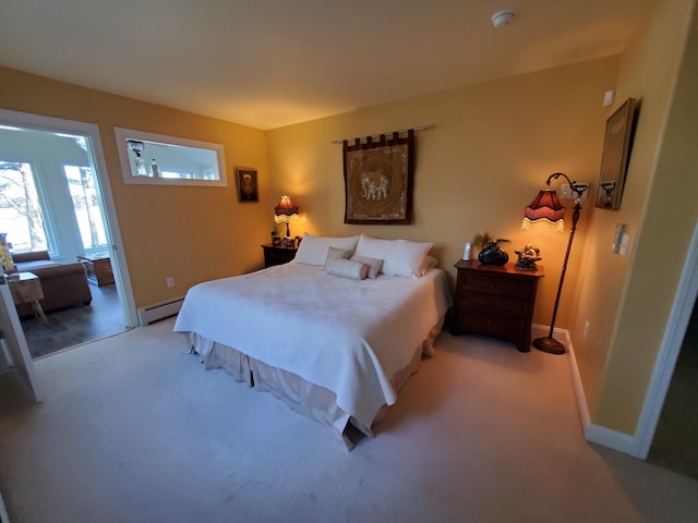 124 Collette Rd, Holden, ME 04429 - bedroom featuring a baseboard radiator, carpet floors, and baseboards