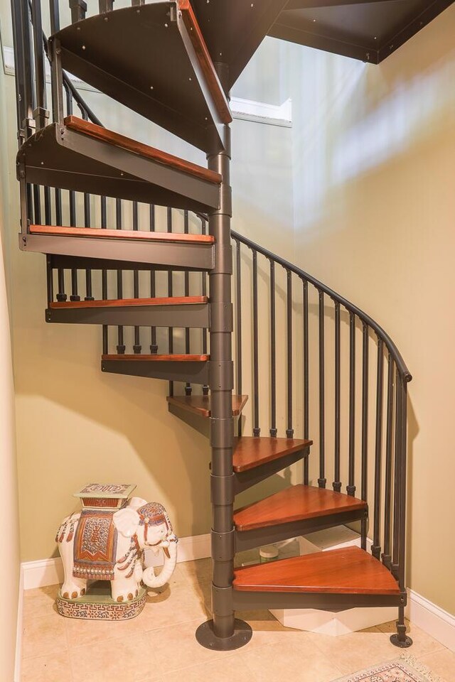 124 Collette Rd, Holden, ME 04429 - stairs featuring baseboards and tile patterned floors