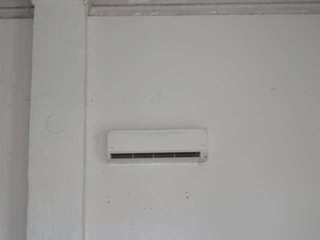 562 Ledge Hill Rd, Corinth, ME 04427 - details featuring a wall mounted air conditioner