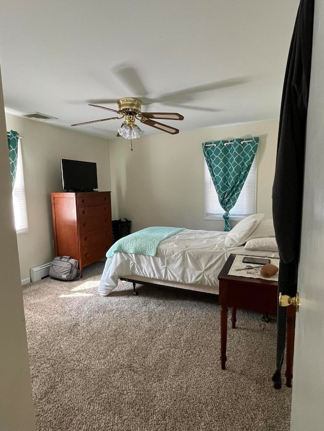 carpeted bedroom featuring ceiling fan