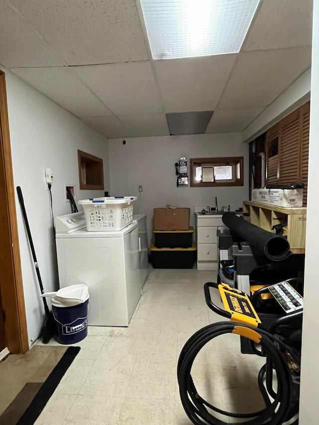 laundry area with independent washer and dryer