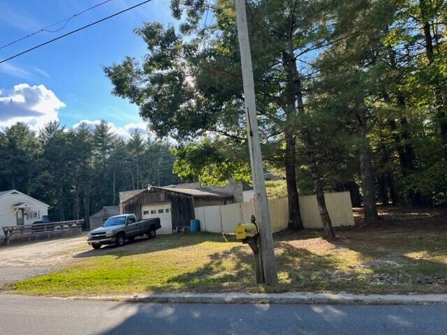 view of side of home with a garage