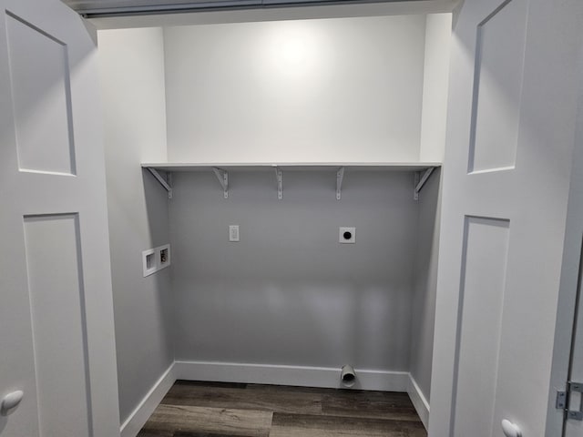 laundry area with hookup for a washing machine, hookup for an electric dryer, dark wood-style flooring, and baseboards