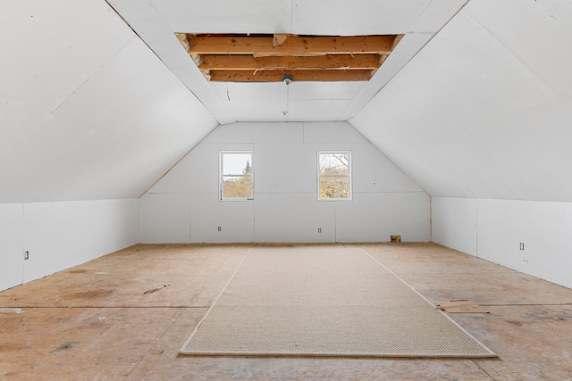 additional living space with vaulted ceiling