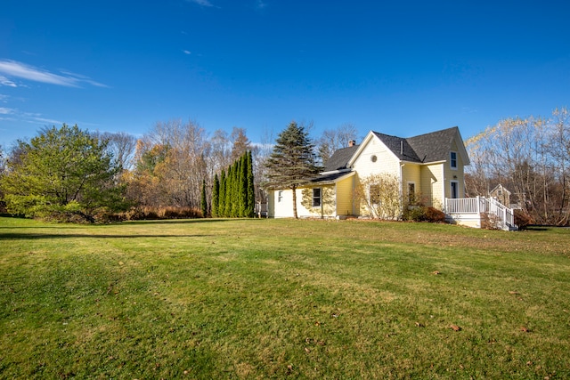 view of home's exterior featuring a lawn