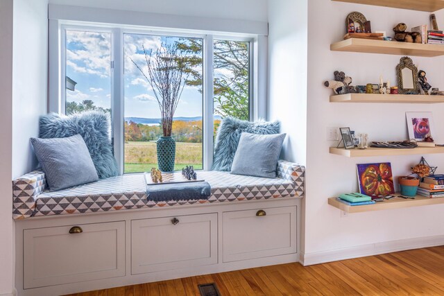 sitting room featuring hardwood / wood-style flooring