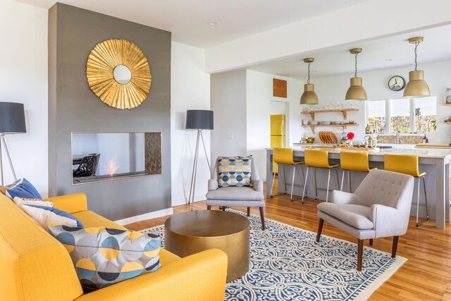 living room with light hardwood / wood-style floors