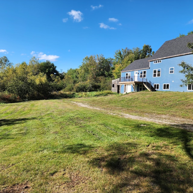 view of yard with a deck