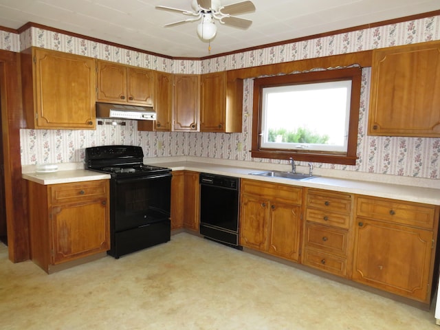 kitchen with black appliances, ceiling fan, light colored carpet, and sink