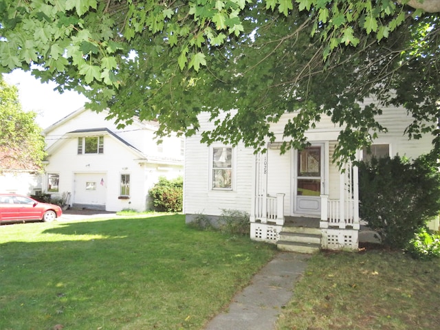 view of front of home with a front yard