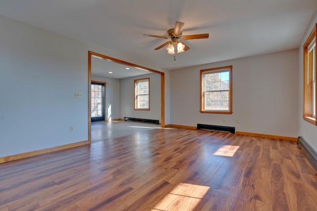 20 Kristas Way, Gorham, ME 04038 - spare room with healthy amount of natural light, a baseboard heating unit, a ceiling fan, wood finished floors, and recessed lighting
