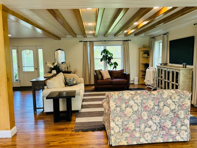 living room featuring beam ceiling and wood finished floors