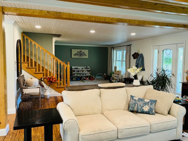 living room featuring stairway, wood finished floors, recessed lighting, ornamental molding, and beamed ceiling