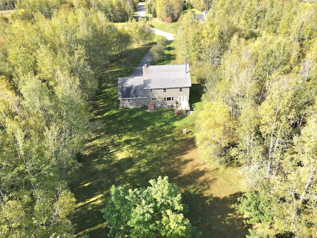 bird's eye view featuring a view of trees